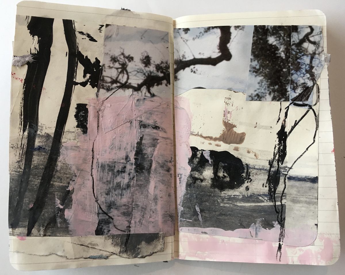 Mixed media notebook with pink and ink marks
